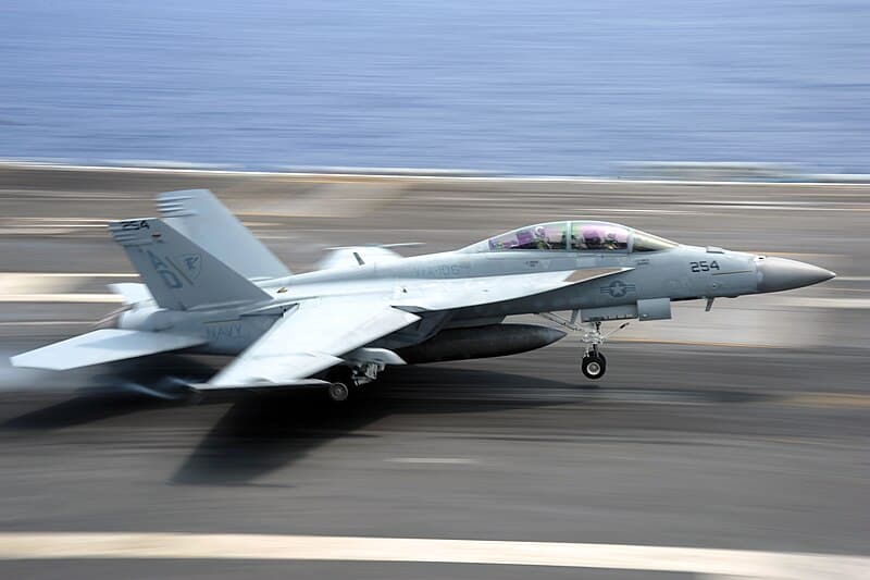 US_Navy_110713-N-AU622-065_An_F-A-18F_Super_Hornet_assigned_to_the_Gladiators_of_Strike_Fighter_Squadron_(VFA)_106_lands_aboard_the_aircraft_carrie